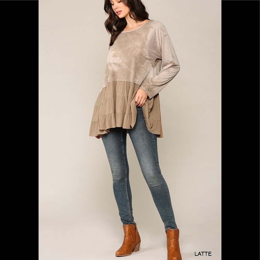 Tie dye knit and solid woven mixed  top with ruffle hem.